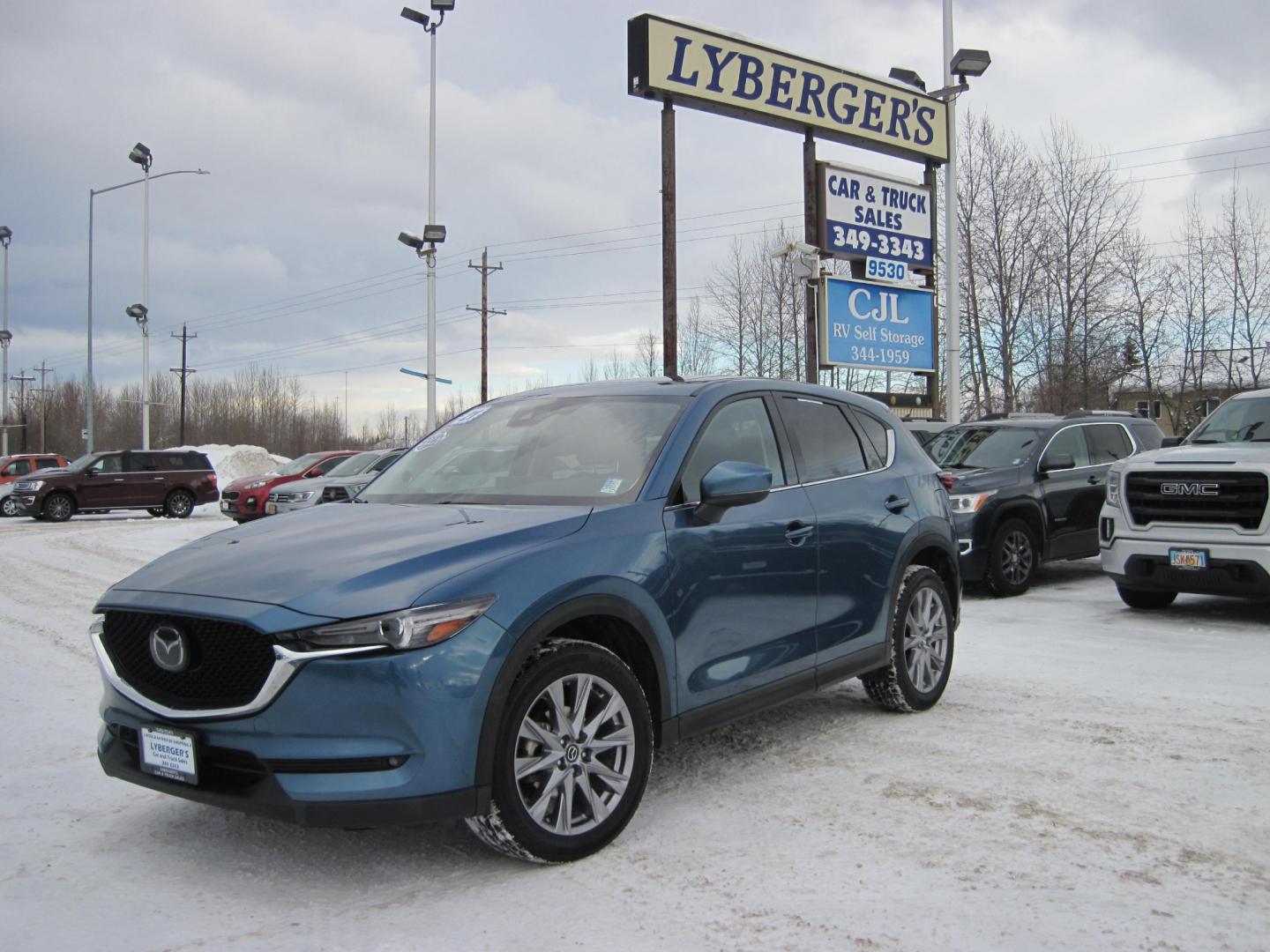 2021 blue /black Mazda CX-5 (JM3KFBDM6M1) , 6A transmission, located at 9530 Old Seward Highway, Anchorage, AK, 99515, (907) 349-3343, 61.134140, -149.865570 - Nice Mazda CX-5 Grand Touring sunroof, come take a test drive. - Photo#0